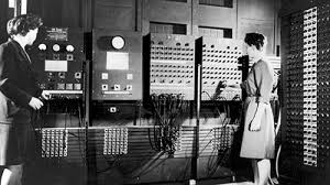 Early electronic computer with vacuum tubes and control panels